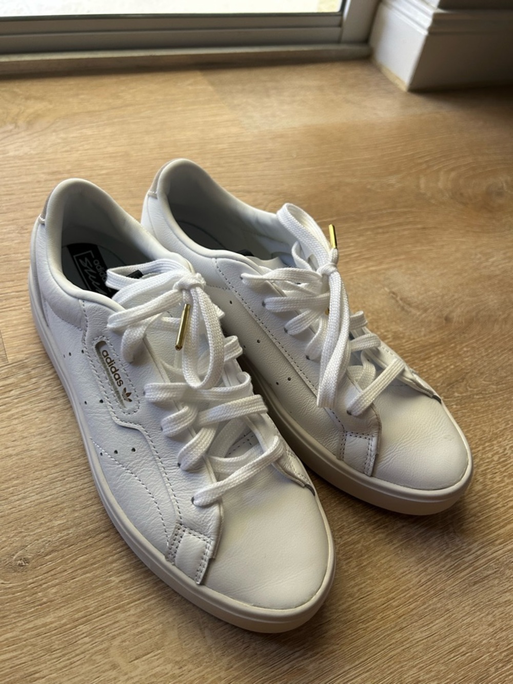 adidas White Leather Sneakers with Gold Lace Tips - size 7.5 Women’s